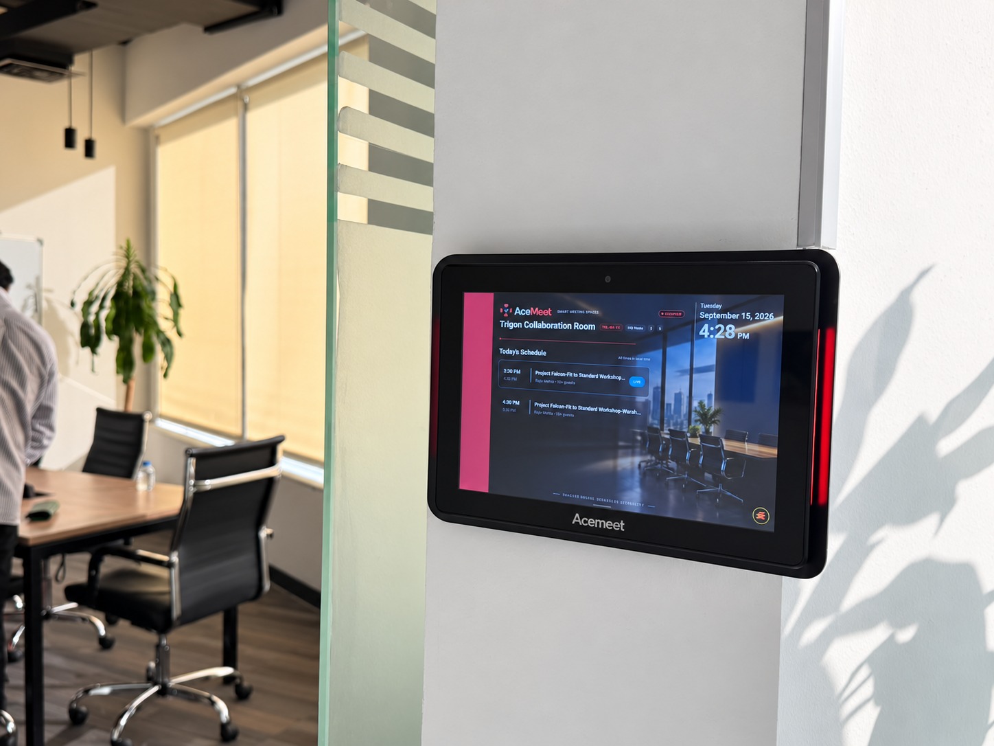 AceMeet display mounted outside a meeting room showing today's schedule